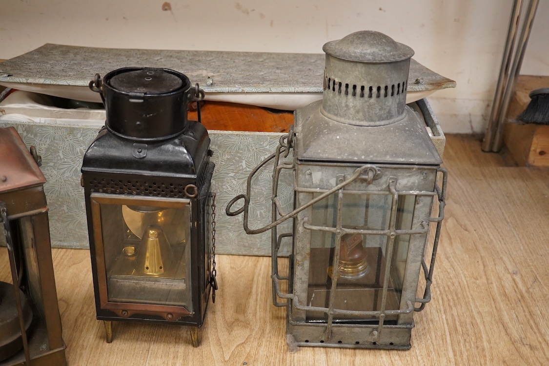 Four various styled lanterns, tallest 42cm high